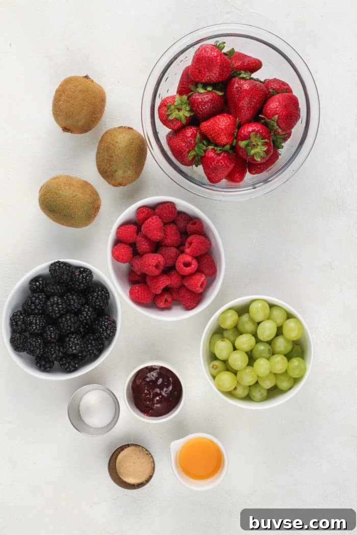 Fresh Fruit Salsa Recipe with Lime and Cilantro 3 Fruit salsa ingredients arranged on a white countertop.