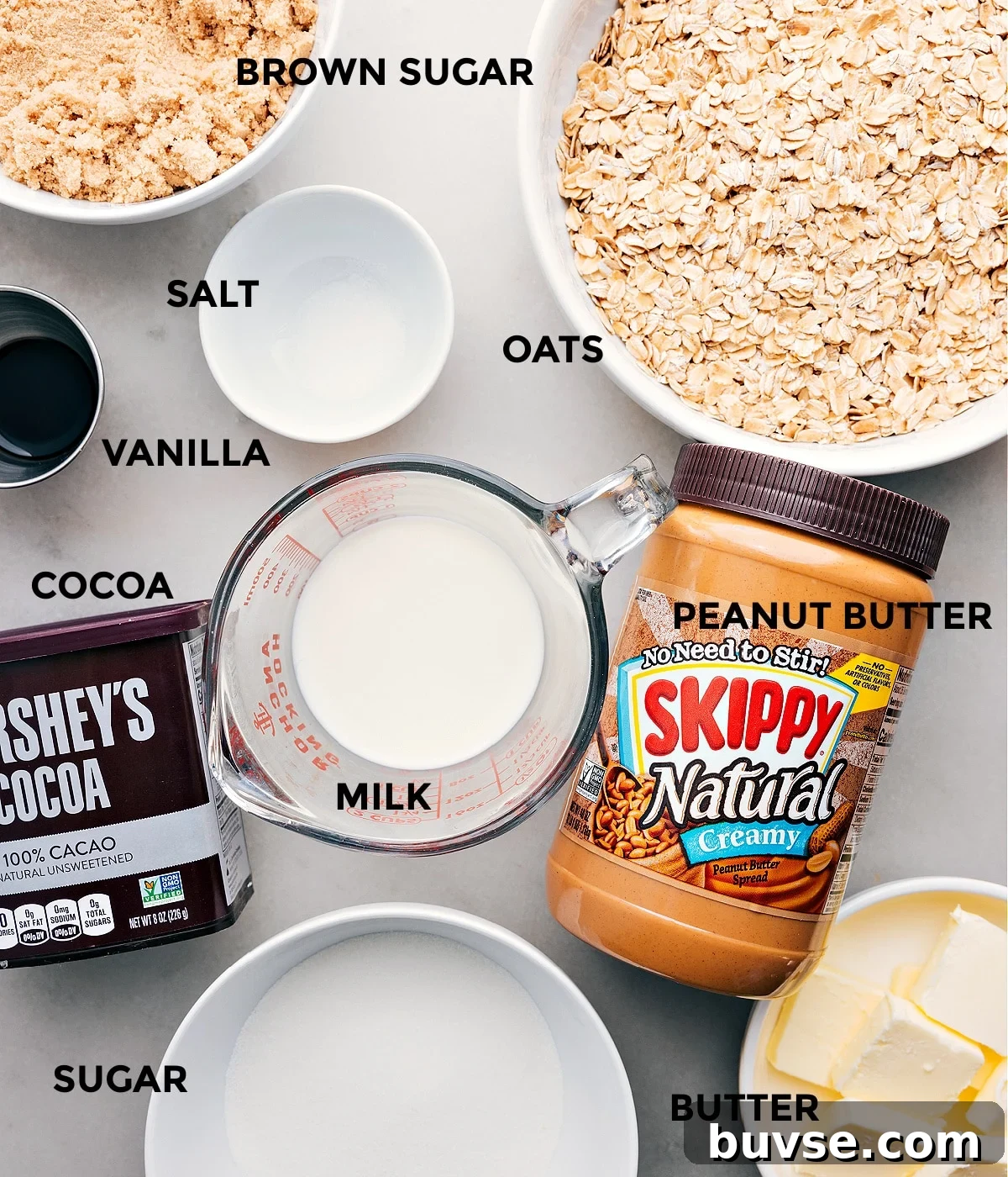 Ingredients in this recipe including oats, salt, peanut butter, vanilla, cocoa, and brown sugar prepped for easy assembly.