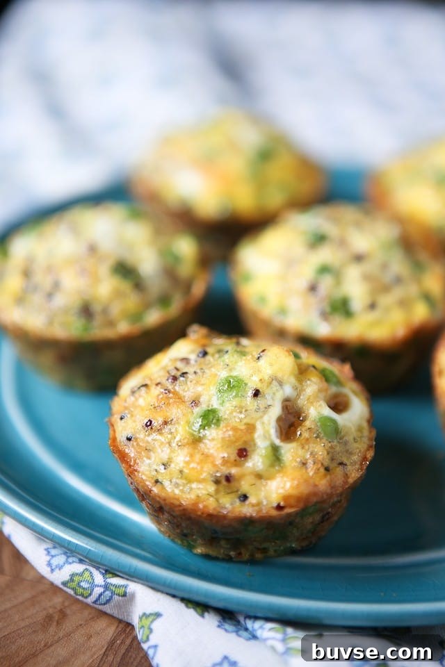 egg and quinoa muffins with peas on blue plate