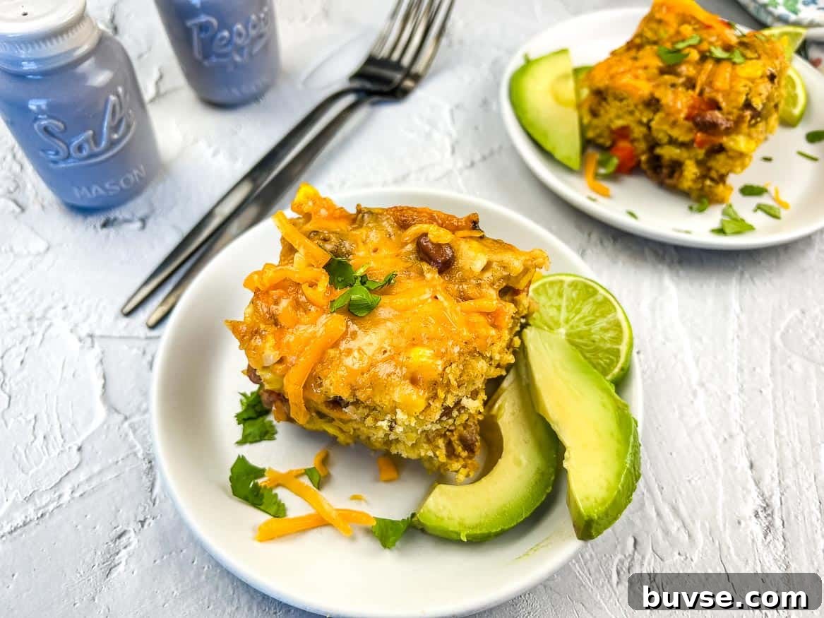 Two servings of Cowboy Cornbread Casserole on plates.