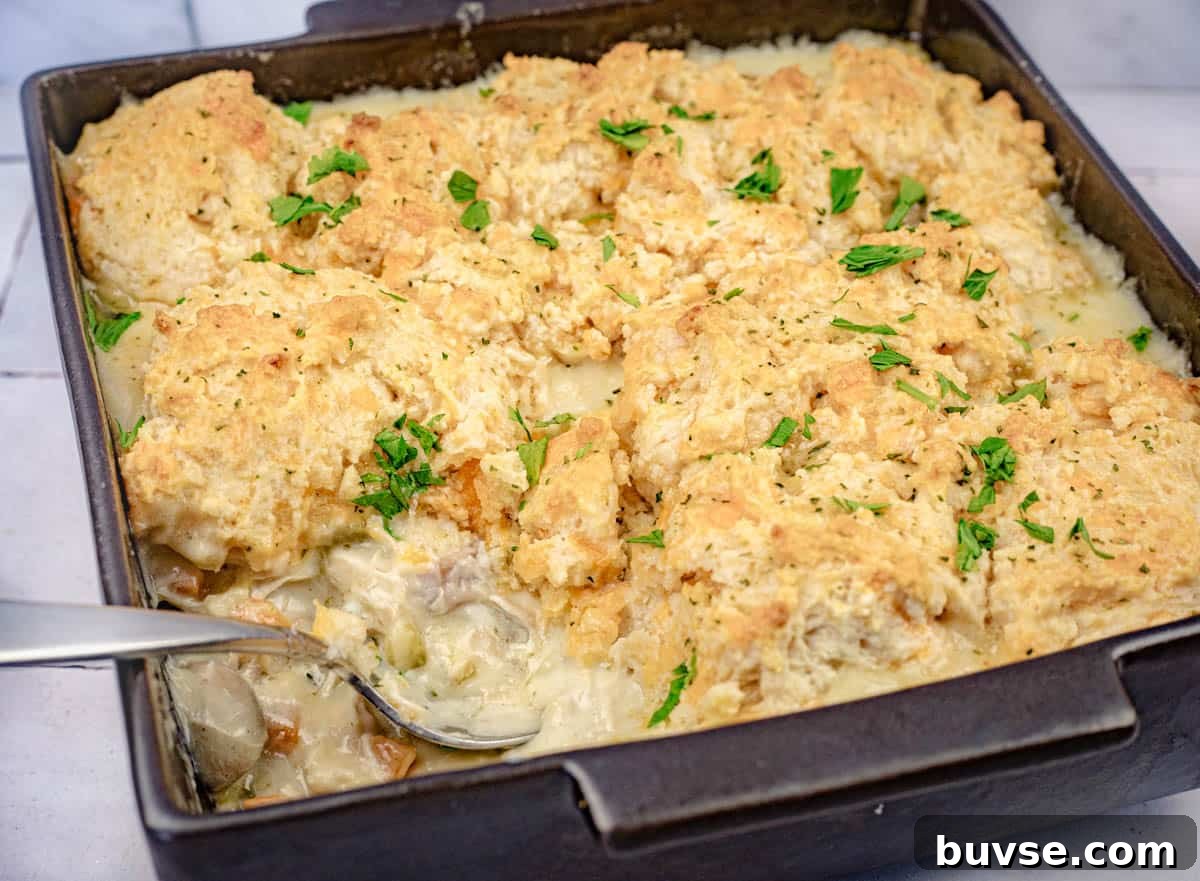 A casserole dish of Chicken Cobbler with Red Lobster Biscuit.