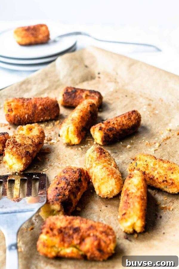 Crispy Potato Croquettes Recipe for Golden Homemade Bites 6 These potato croquettes are a classic side dish. The perfect combination of a crunchy outside and a soft inside! Bake in the oven or shallow fry in a skillet.