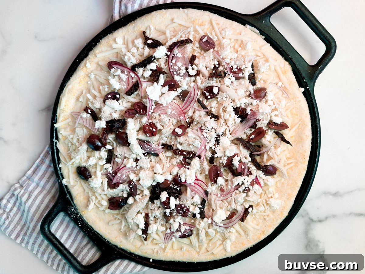 Pesto Chicken Pizza being prepared