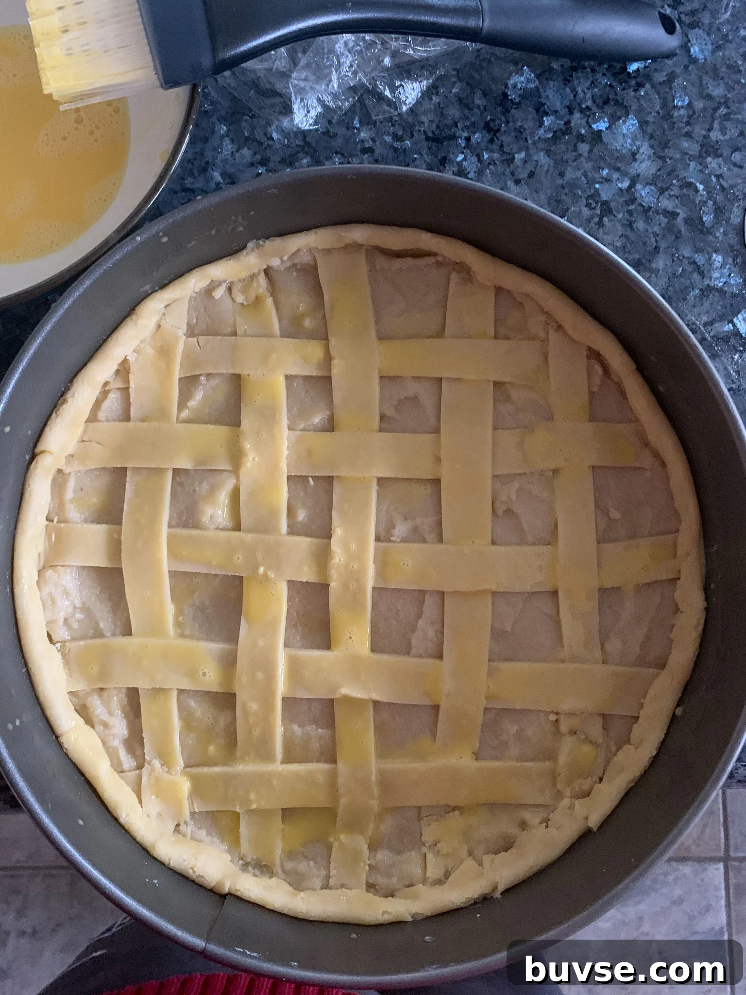 Lattice work on top of the cake ready for baking.