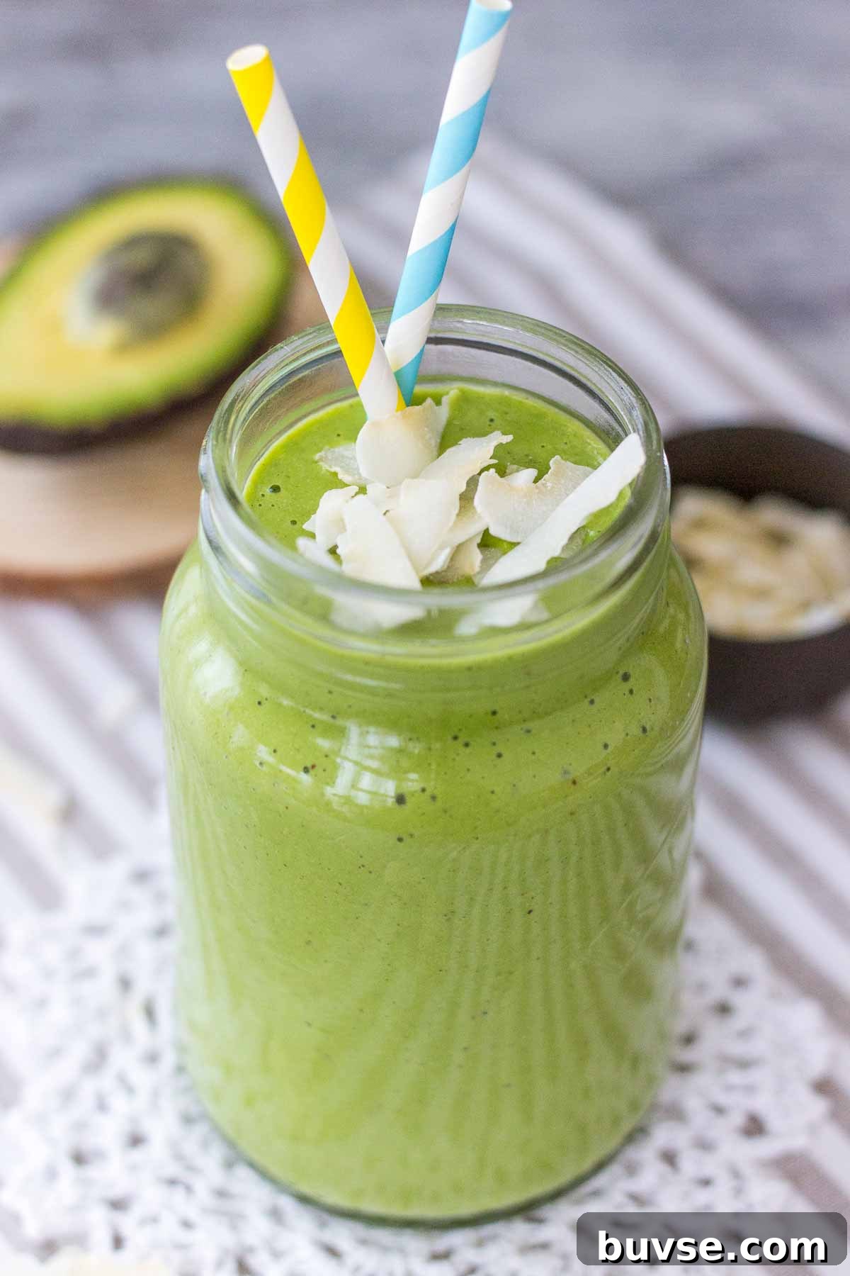 Matcha Protein Shake Recipe for Energizing Mornings 8 Matcha Protein Shake in a glass jar with straw