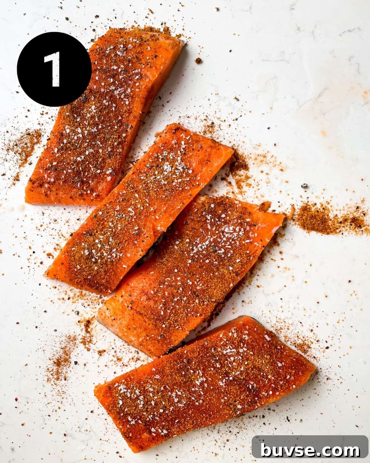 salmon filets seasoned with cajun seasoning.