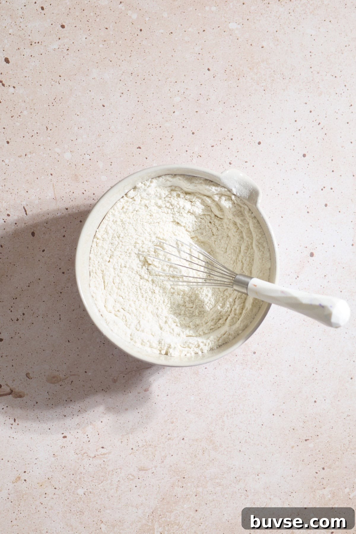 Dry ingredients whisked in a small mixing bowl.
