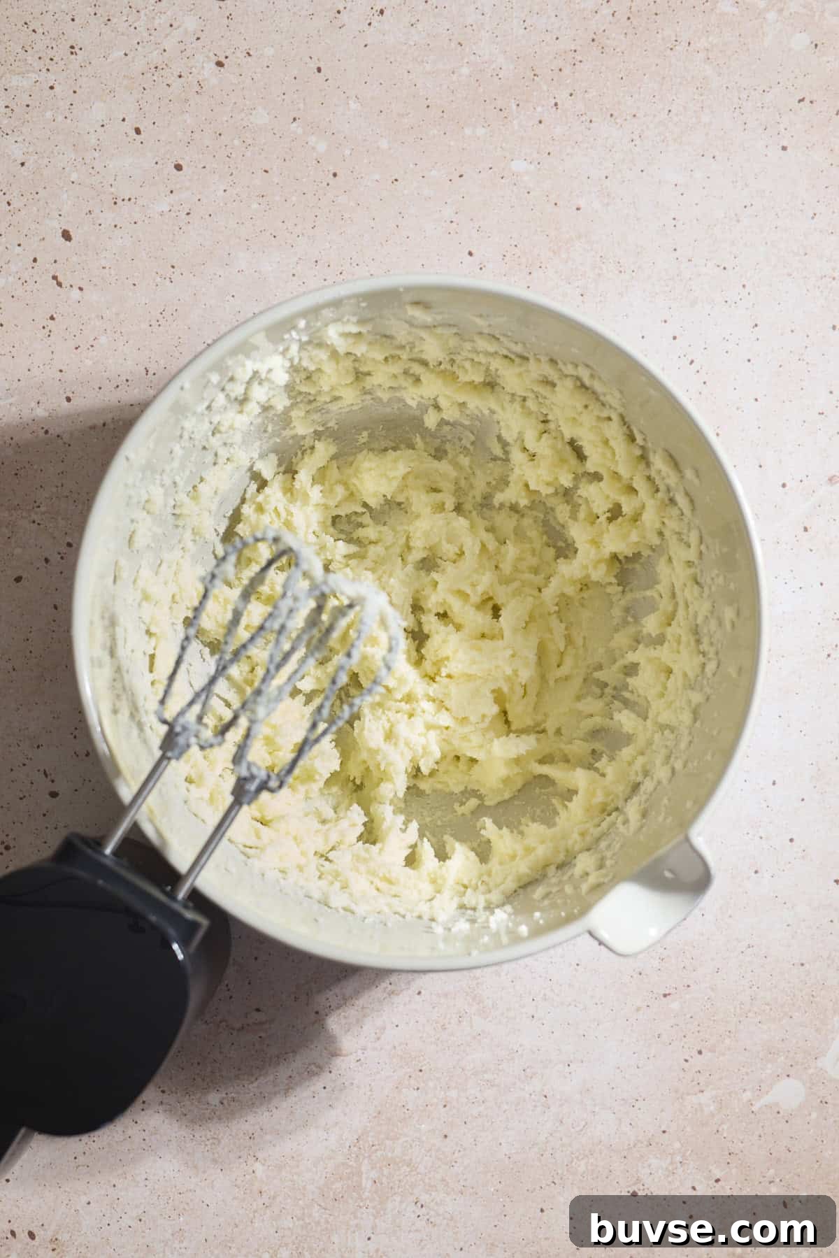 Creamed butter and sugar in a large mixing bowl.