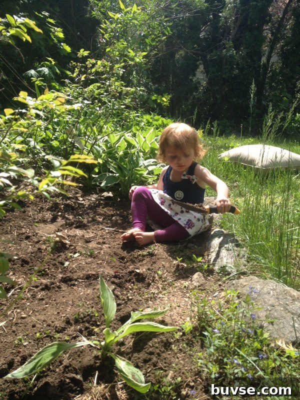 Child helping with garden or farm tasks