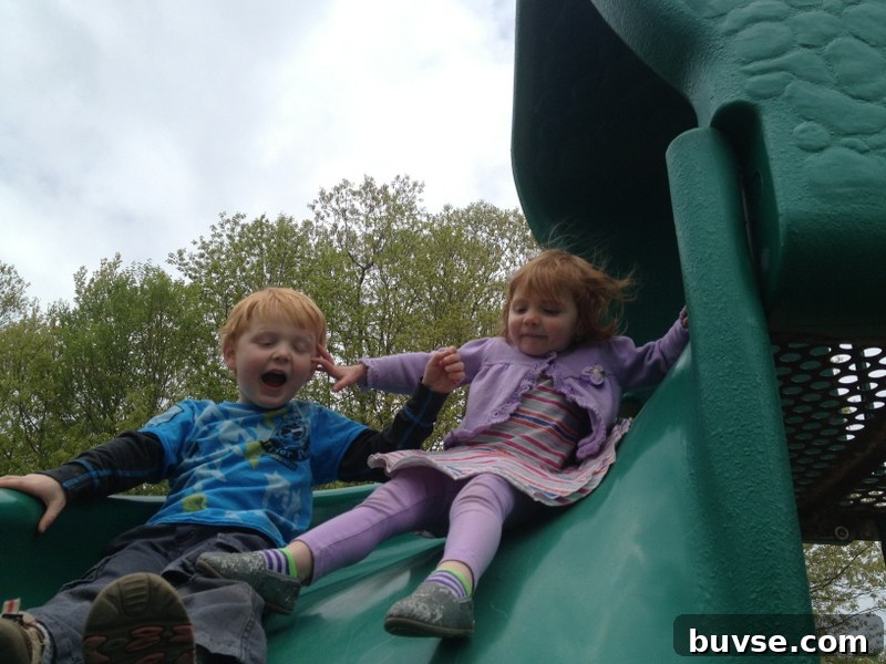 Energetic redhead child pushing through crowd