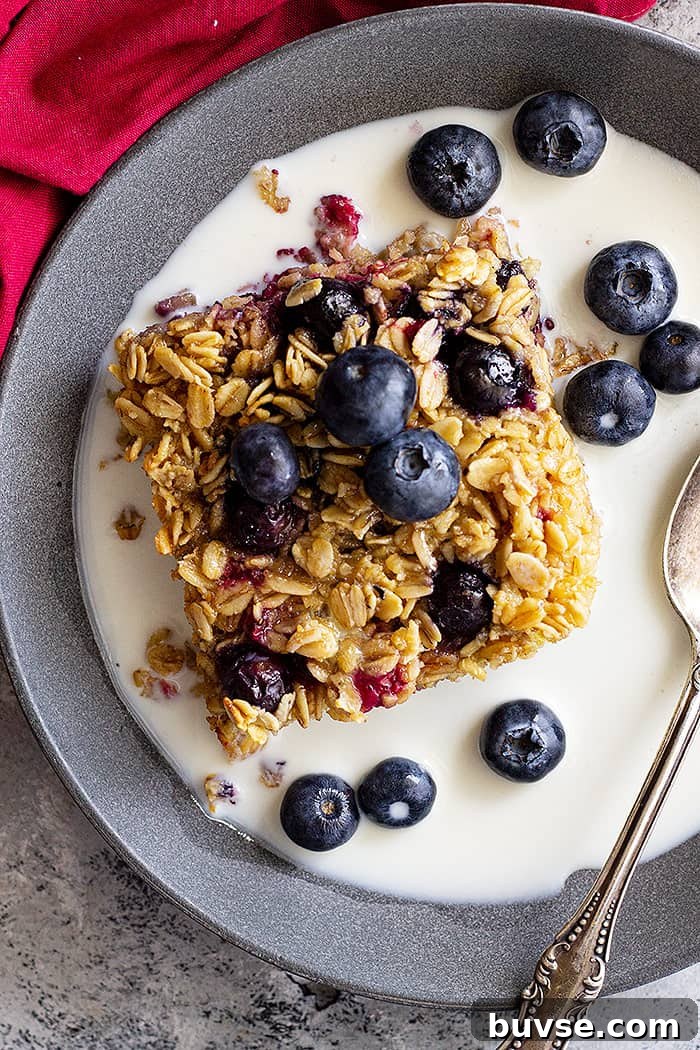Pantry Recipes: Creative Shelf Cooking with Staples 3 Baked oatmeal in a bowl topped with fresh blueberries and a splash of milk.