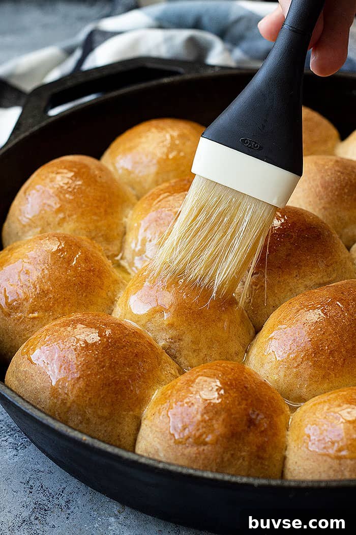 Pantry Recipes: Creative Shelf Cooking with Staples 45 Melted butter being brushed on freshly baked dinner rolls.