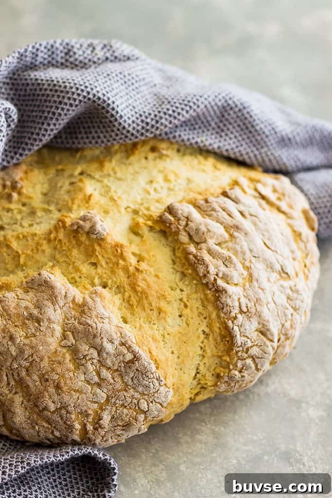 Pantry Recipes: Creative Shelf Cooking with Staples 58 Round loaf of Traditional Irish Soda Bread wrapped in a towel.