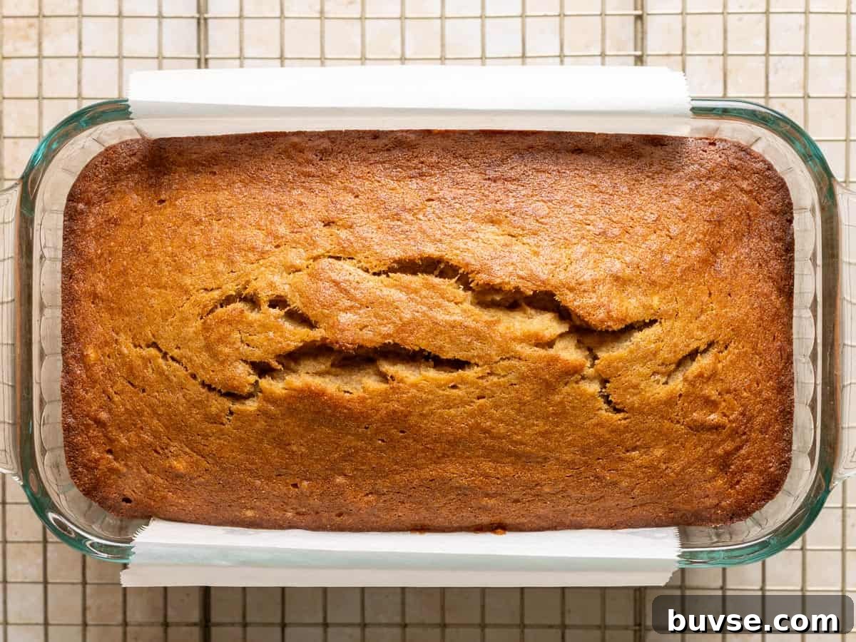 One-Bowl Brown Butter Mochi Banana Bread Recipe 10 Baked mochi banana bread in a loaf pan.