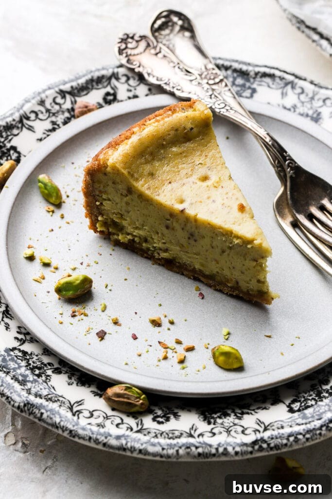 slice of pistachio cheesecake on a plate