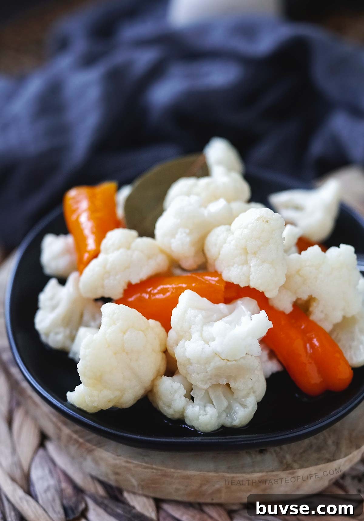 Lacto-Fermented Cauliflower Recipe: Tangy and Probiotic 7 Crunchy fermented cauliflower with sweet peppers ready to be enjoyed.
