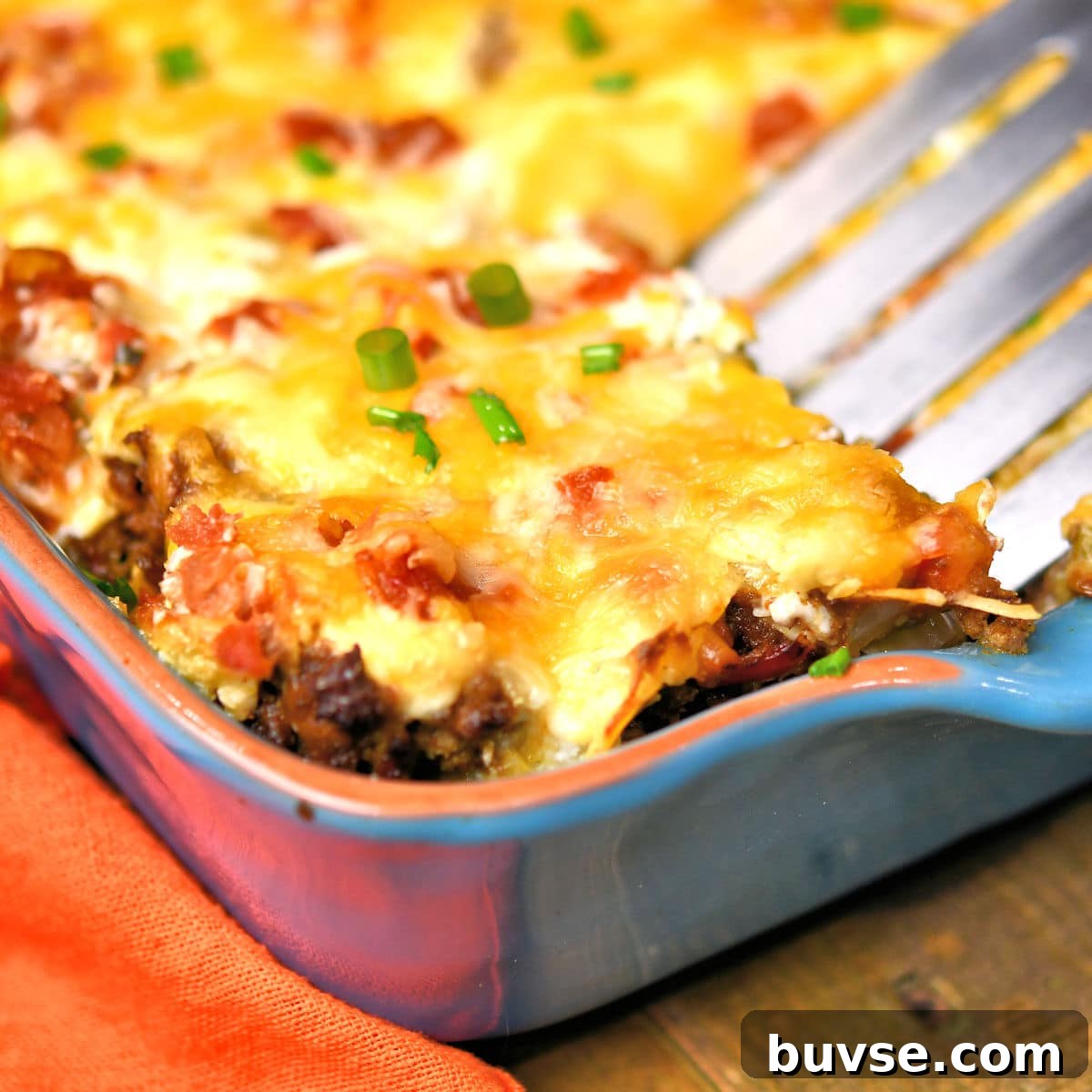 closeup of spatula lifting out piece of cowboy casserole