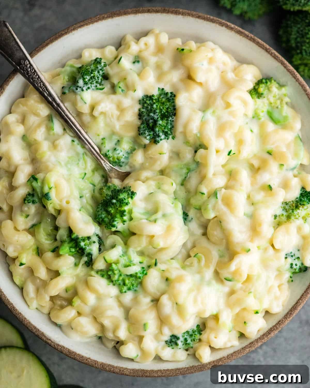 bowl of mac and cheese with spoon