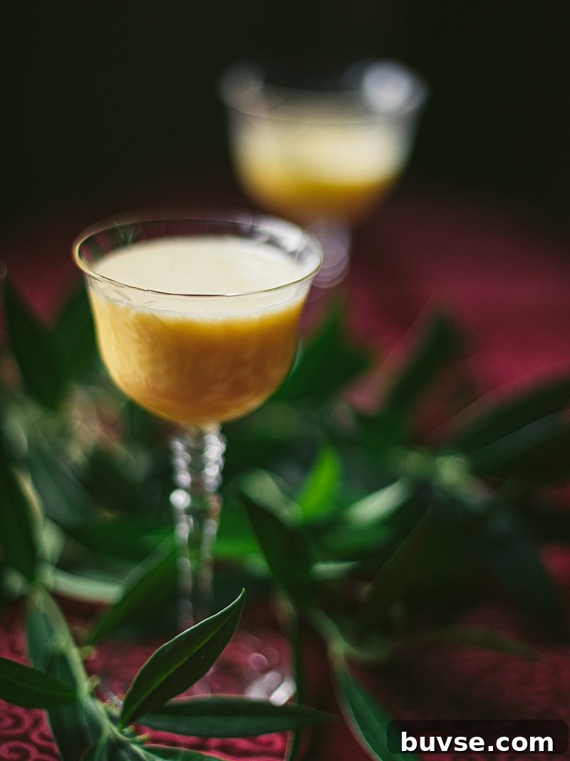 Zabaglione (Zabaione) Recipe: Classic Italian Egg Custard 3 two cut glass dessert cups of zabaglione with festive background