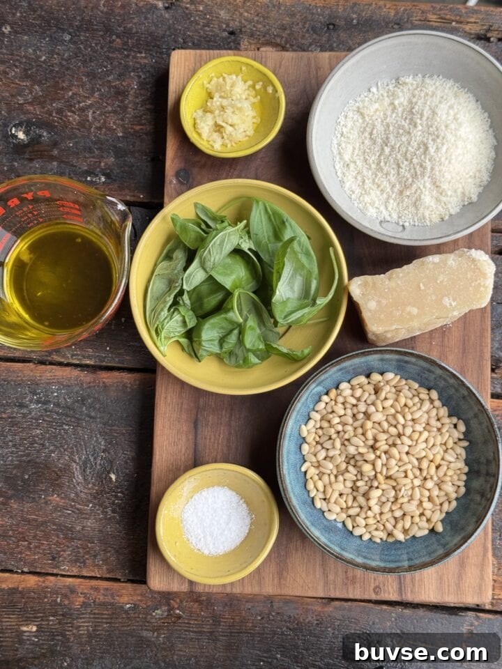 Ingredients for homemade pesto: basil, pine nuts, garlic, olive oil, Parmesan