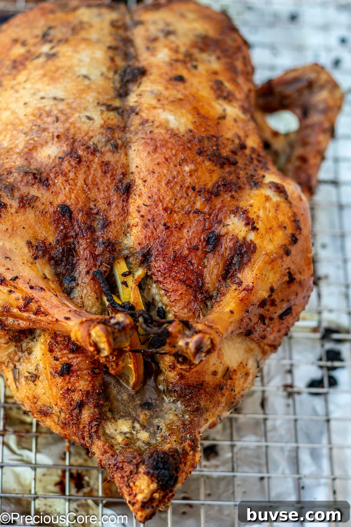 Herb Roasted Duck Recipe with Crispy Skin 3 Up close shot of herb-roasted duck.