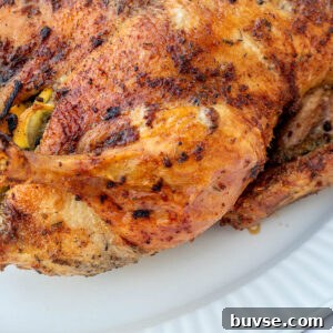 Herb Roasted Duck Recipe with Crispy Skin 11 Herb Roasted Duck on a white serving tray.