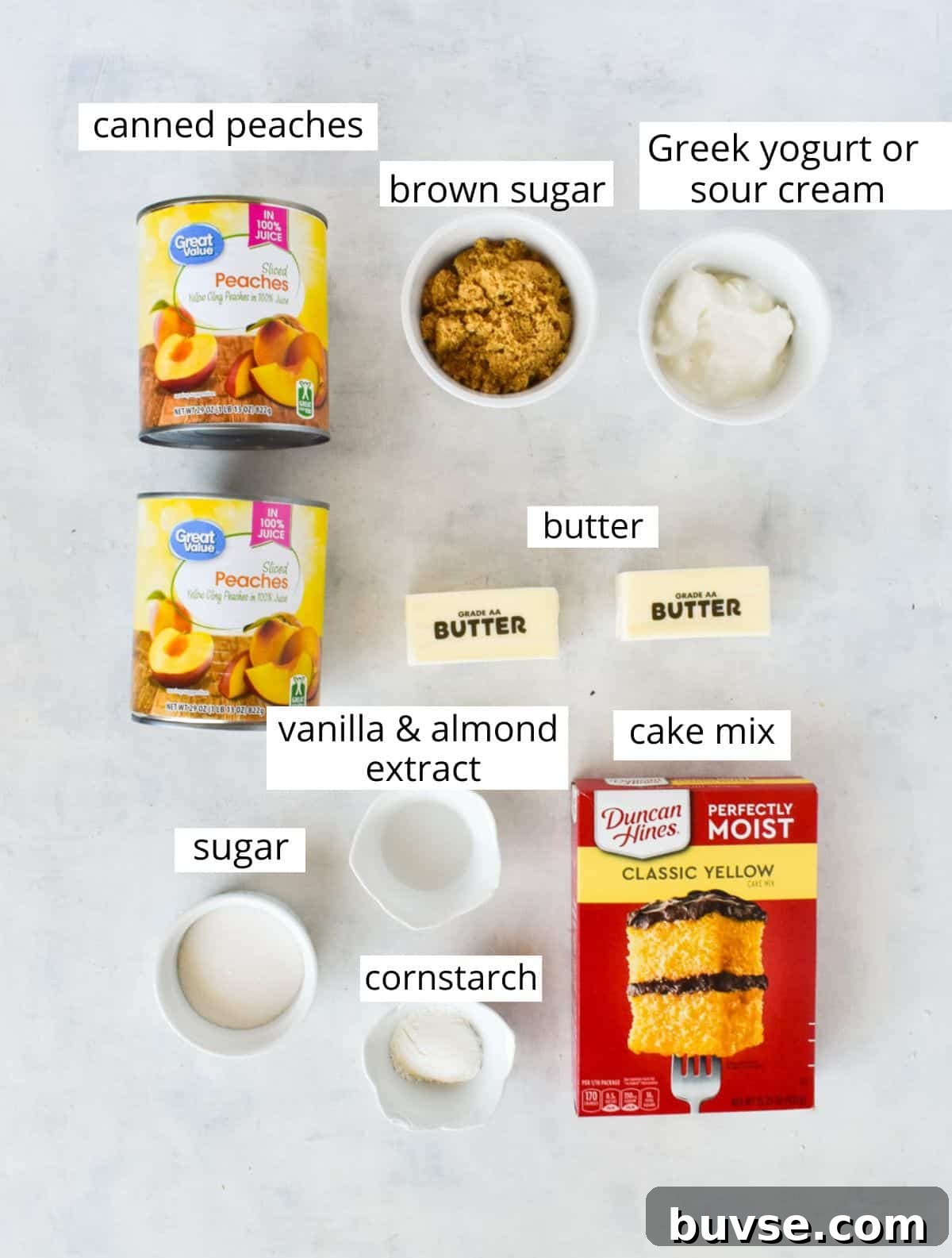 Quick Peach Cobbler with Canned Peaches and Cake Mix 3 Ingredients for cobbler laid out with labels.