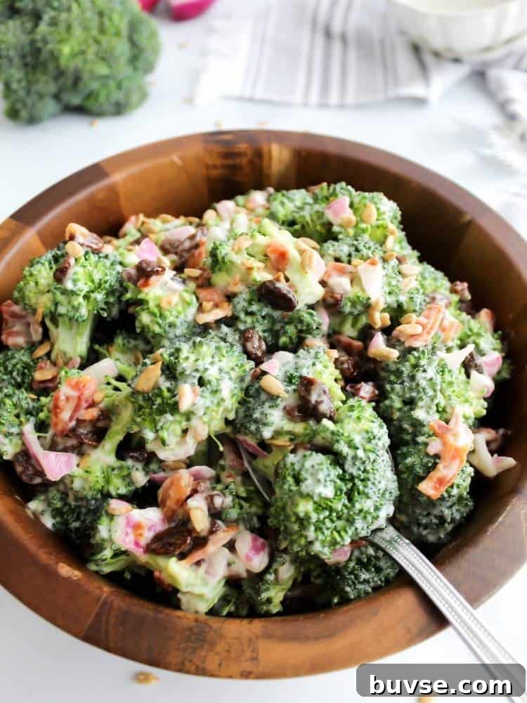 Refreshing Summer Picnic Menu Ideas to Wow Guests 7 Large wood serving bowl filled with a creamy broccoli salad