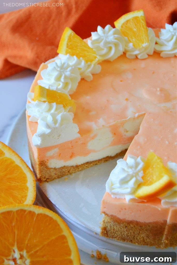 orange creamsicle cheesecake with orange halves