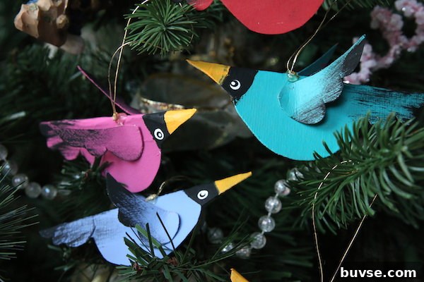 colourful birds made from cardboard cereal box