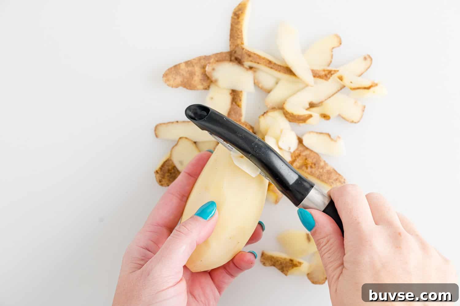 Mashed potato being peeled.