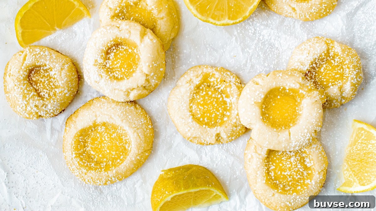 lemon curd cookies scattered on parchment paper