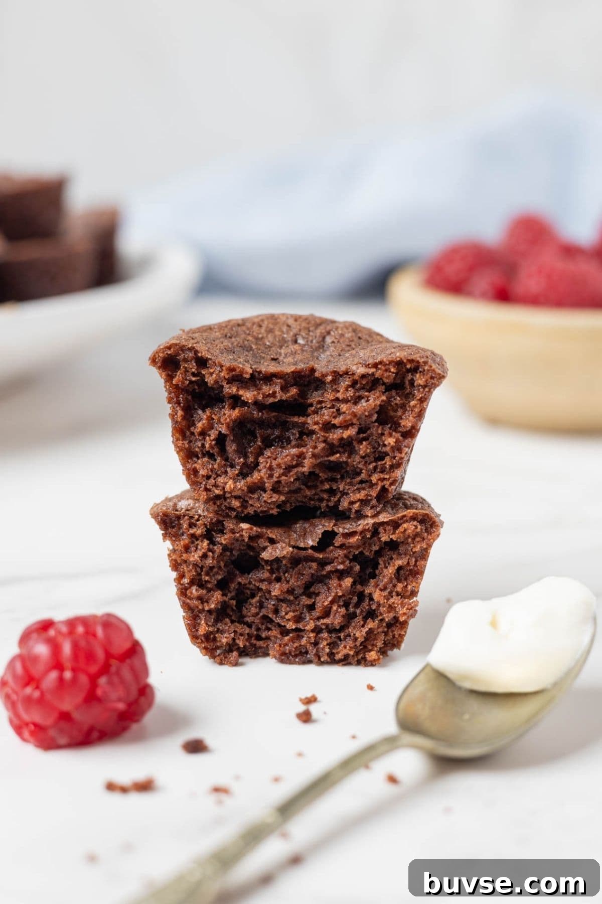 Fudgy Chocolate Sourdough Brownie Bites 3 Stacked sourdough chocolate brownie bites showing the rich, fudgy texture inside.