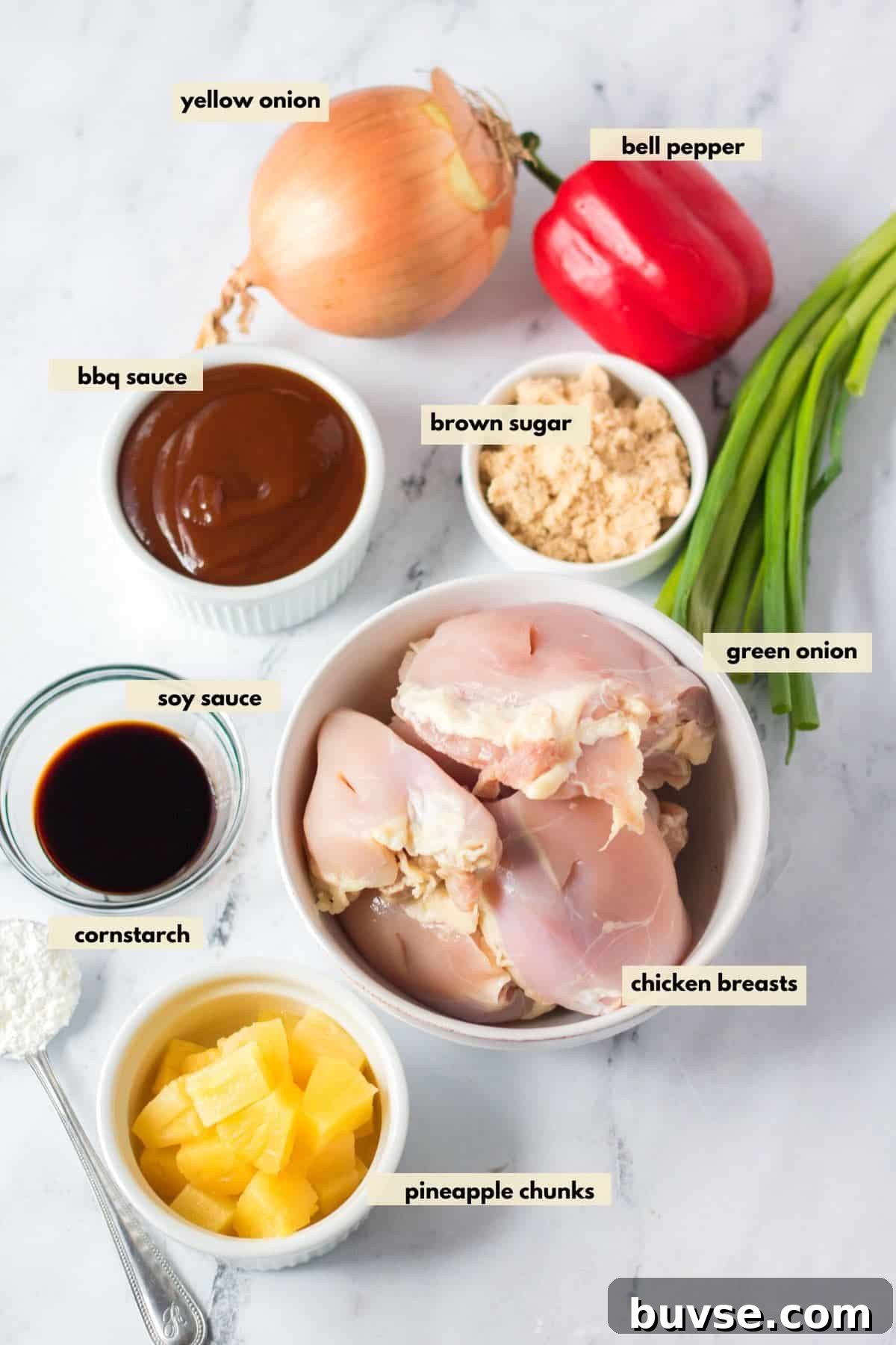 Ingredients for Hawaiian chicken are pineapple, brown sugar, onion, bell pepper, green onions, bbq sauce, soy sauce, brown sugar.