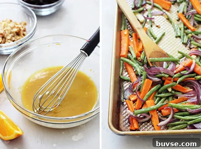 A glass bowl filled with maple orange dressing and a whisk, and a tray of roasted veggies with a wooden spoon.