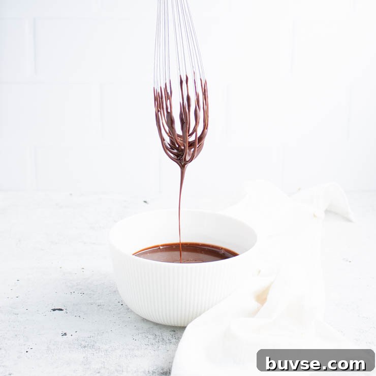chocolate ganache being whisked.
