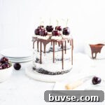 black forest cake with a chocolate ganache drip.