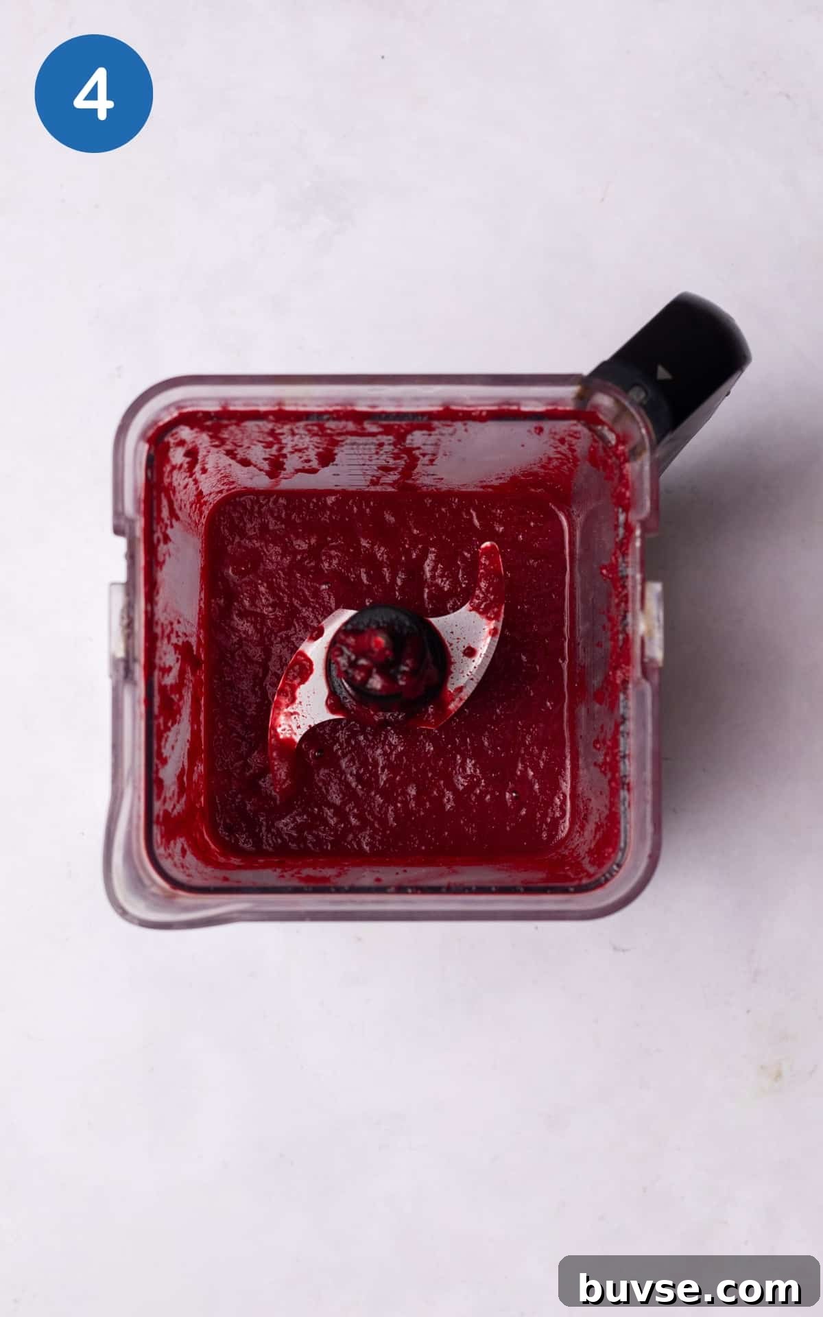 blending beetroot with onion, garlic, and vegetable stock.