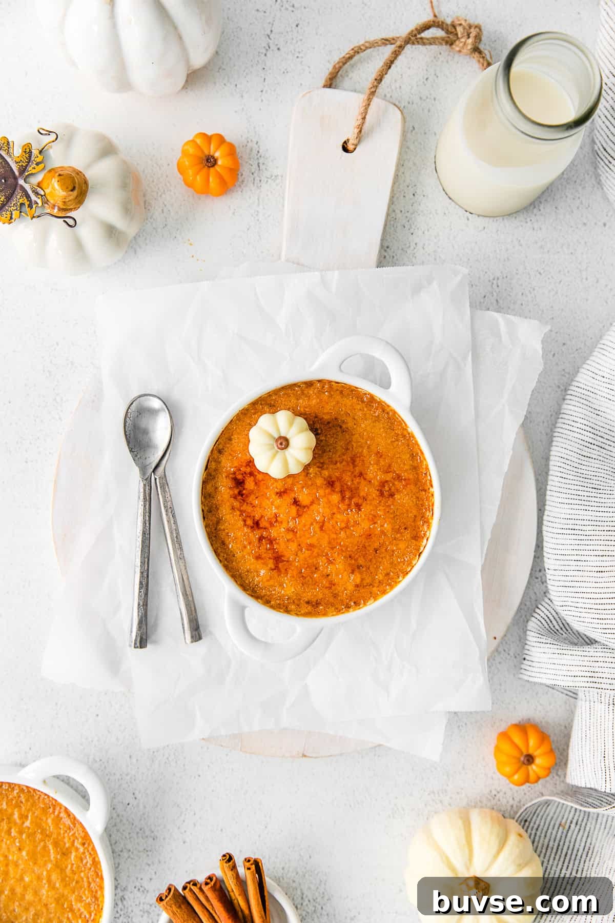 Silky Pumpkin Crème Brûlée Recipe 5 Pumpkin Creme Brulee topped with sugar.