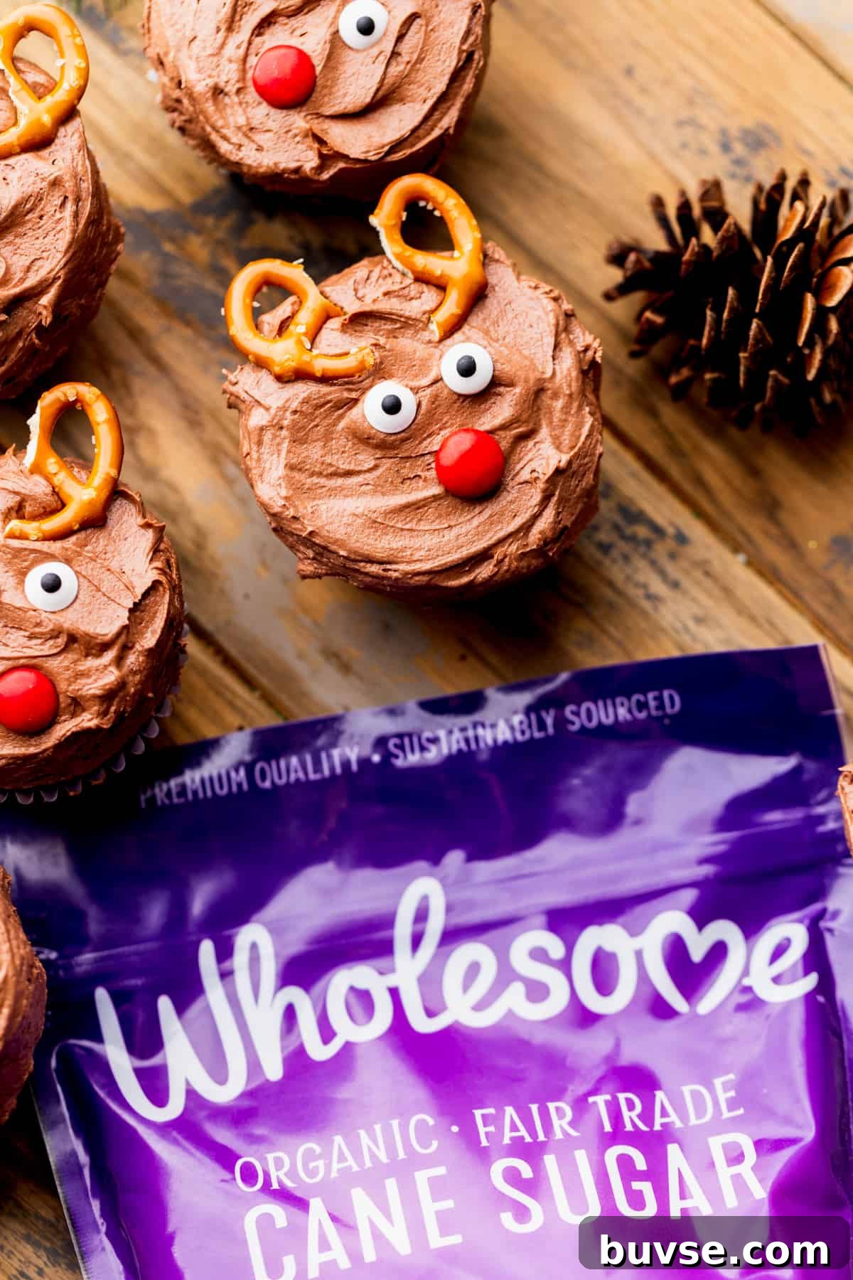 Reindeer cupcakes with a bag of sugar.