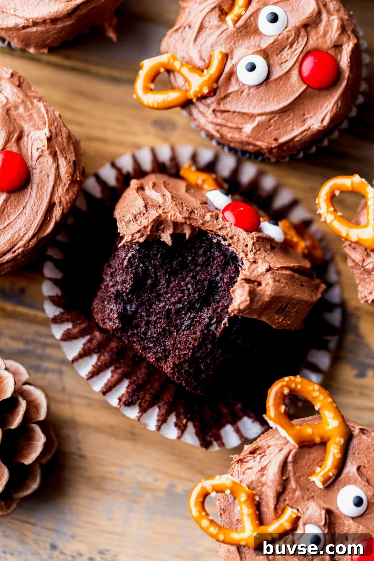 One bite missing from cupcake.