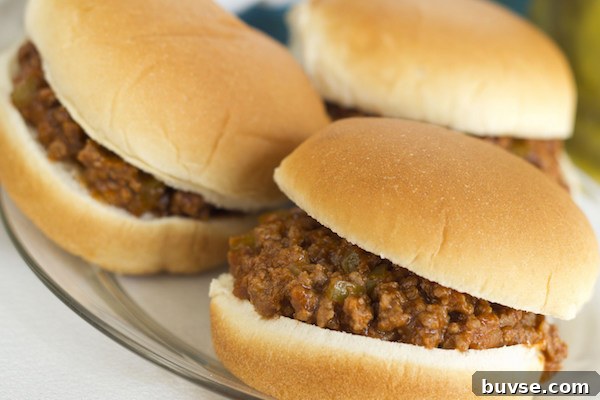 3 sloppy joe sandwiches on hamburger buns