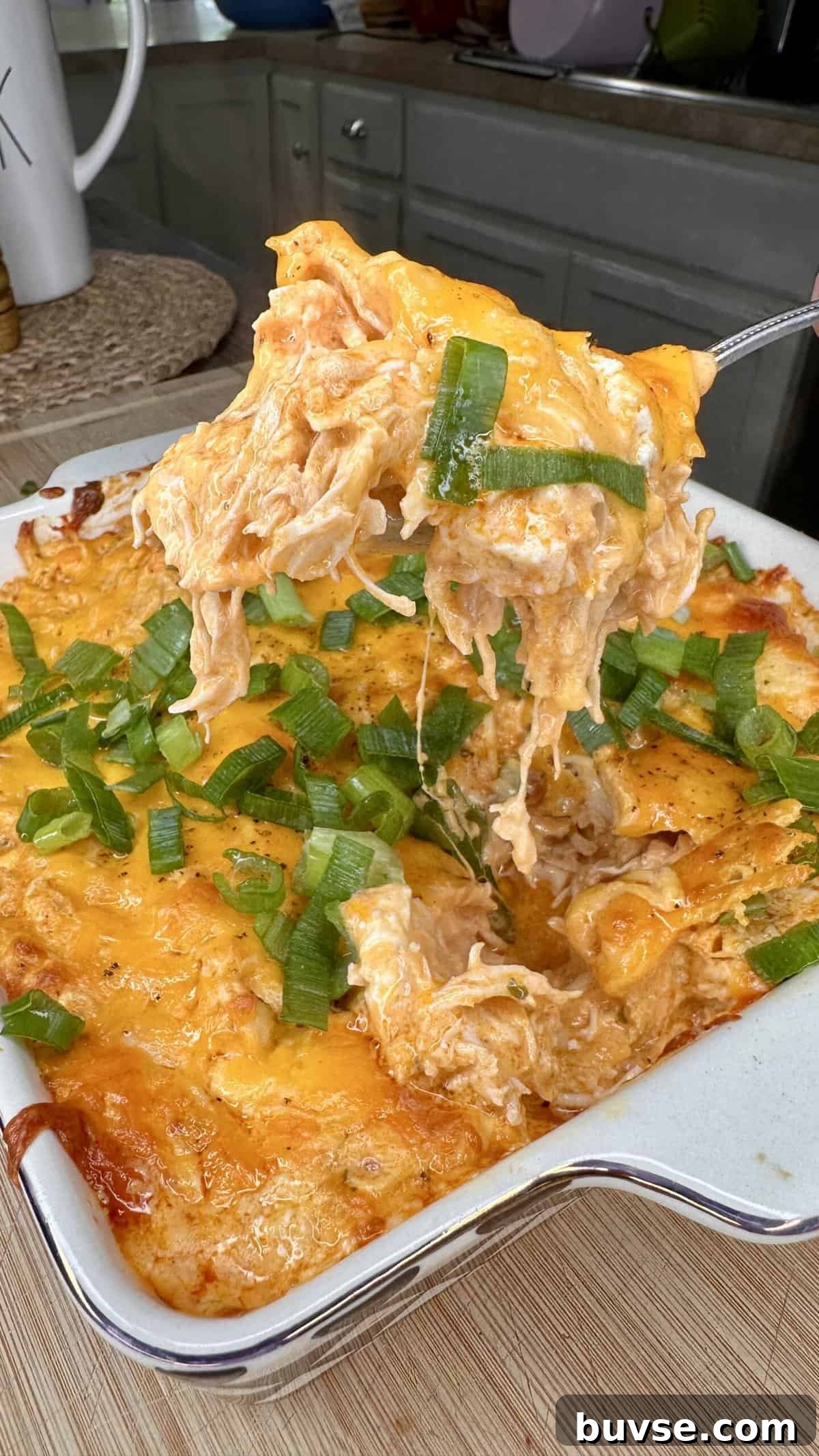 Creamy buffalo chicken dip with a golden top