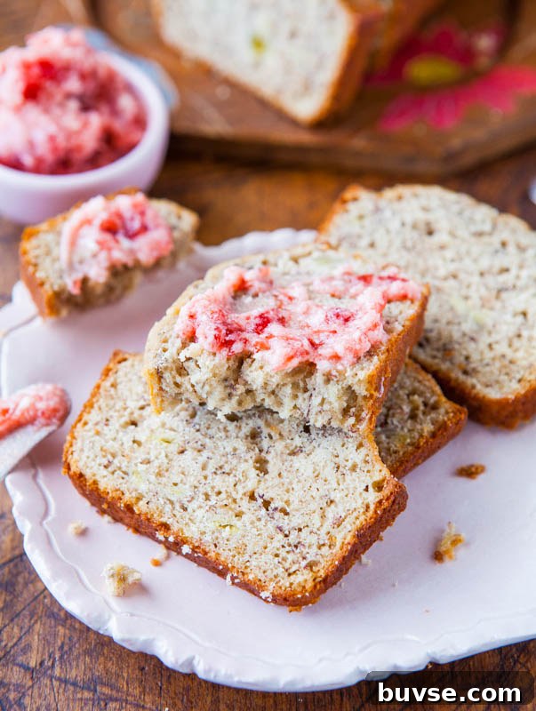 banana bread with buttermilk in it topped with strawberry butter