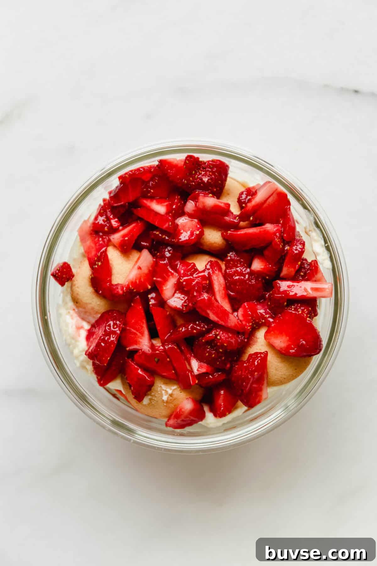 chopped strawberries layered on nilla wafers and greek yogurt pudding mix.