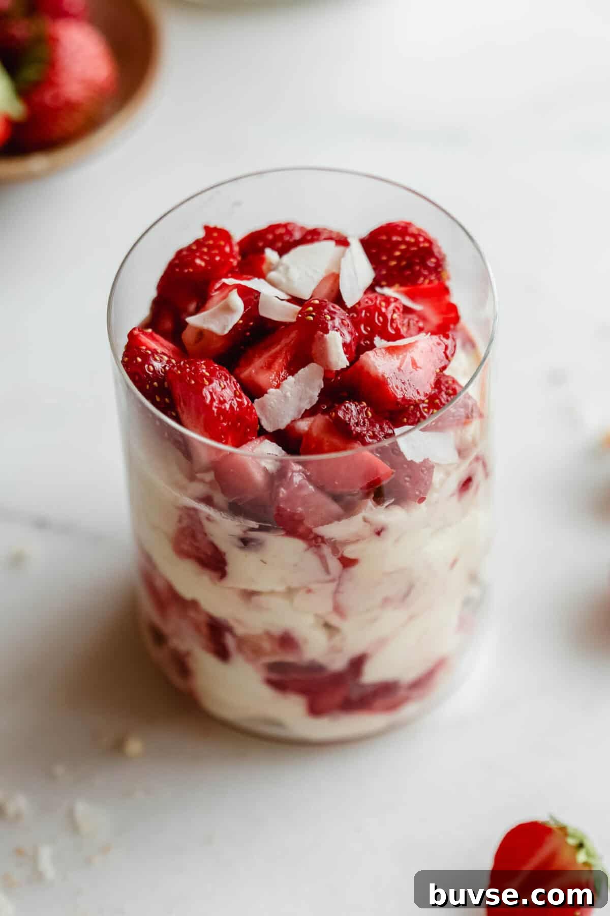 Strawberry pudding jar made with Greek yogurt, Nilla wafers, and vanilla pudding mix.