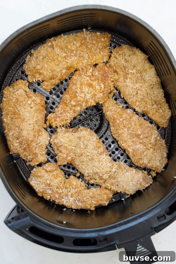 Air fryer chicken tenders crisping