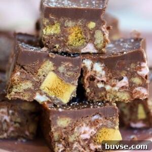 A plate of gluten free rocky roads with Crunchie pieces.