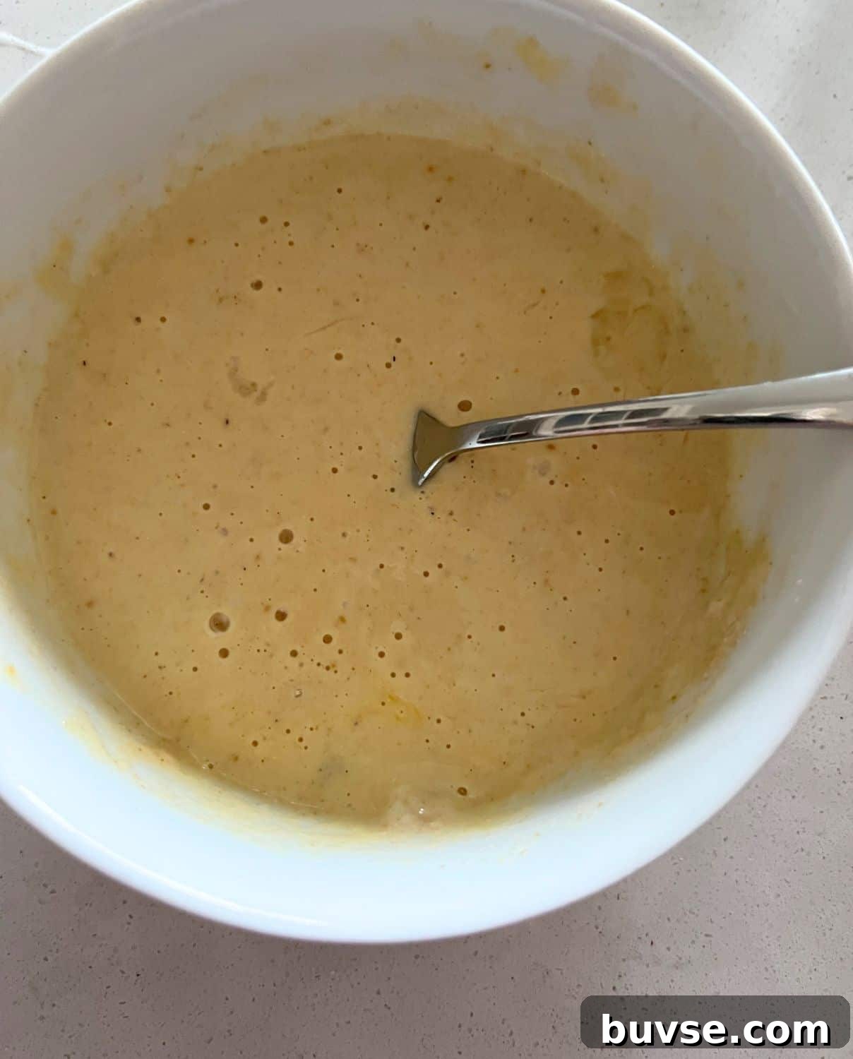 High-Protein Weight Watchers Waffles 4 Waffle ingredients mixed together in a bowl.