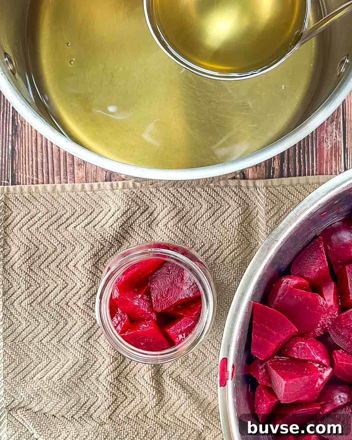 Homemade Old-Fashioned Pickled Beets Recipe 13 The cooked and sliced red beets in a canning jar.